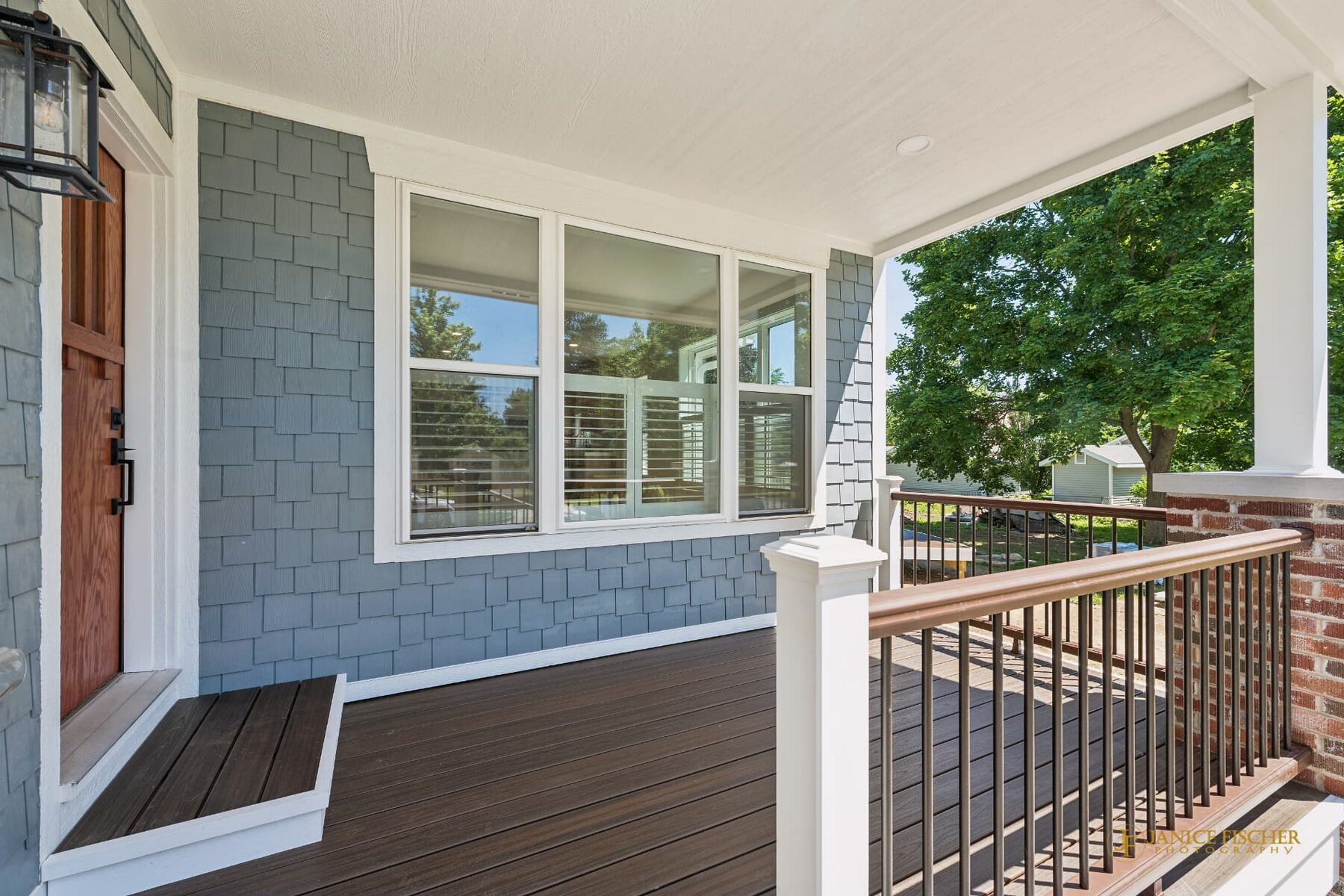 Lake Geneva home remodel porch with composite decking and railing